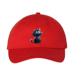 A red DadHat cap featuring the #0001 printed design depicting a cat