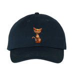 Une casquette dadhat marine ornée du motif #0016 motif représentant un chat