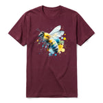 Un T-shirt marron à manches courtes et col rond, orné d'un motif représentant un arthropod sur le devant.