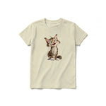 Un T-shirt latte à manches courtes et col rond pour jeune, orné d'un motif représentant un chat sur le devant.