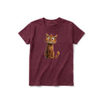 A maroon short-sleeve crewneck t-shirt for youth featuring a graphic of a cat on the front.