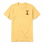 A mustard short-sleeve crewneck t-shirt for adult featuring a graphic of a cat on the left chest.