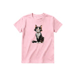 A pink short-sleeve crewneck t-shirt for youth featuring a graphic of a cat on the front.