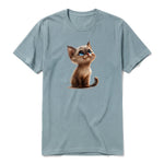 A sage short-sleeve crewneck t-shirt for adult featuring a graphic of a cat on the front.