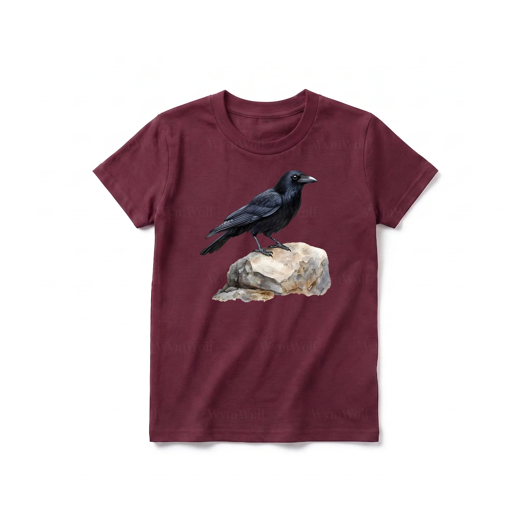 Un T-shirt marron à manches courtes et col rond pour jeune, orné d'un motif représentant un oiseau sur le devant.