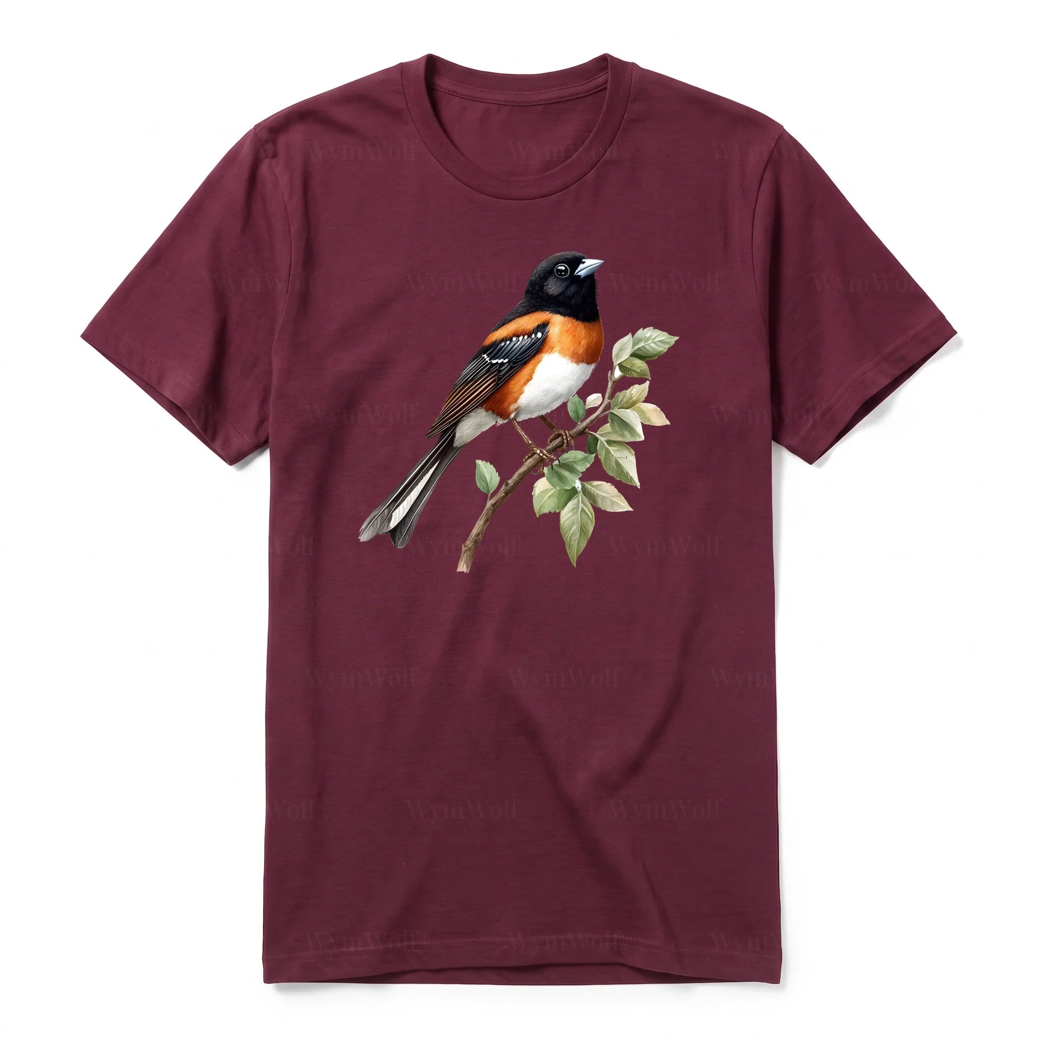 Un T-shirt marron T-shirt à col rond et manches courtes pour adulte, orné d'un motif représentant un oiseau sur le devant.