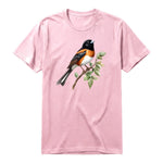 A pink short-sleeve crewneck t-shirt for adult featuring a graphic of a bird on the front.