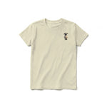 Un T-shirt latte à manches courtes et col rond pour jeune, orné d'un motif représentant un animal de la ferme sur la poitrine gauche.