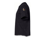 A black short-sleeve crewneck t-shirt  featuring a small graphic of a quirky bird on the upper left sleeve.